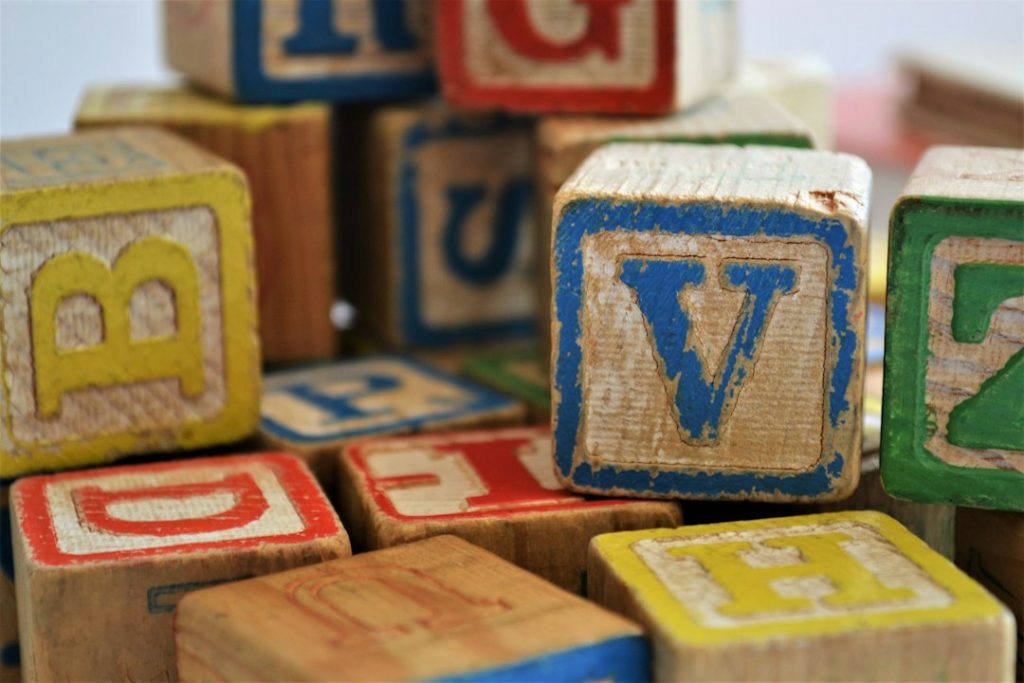 These colorful, scuffed blocks are part of a collection I purchased from a sweet elderly couple who kept them in a box for their grandchildren. Their grandchildren long-grown, they were happy to share them with me.